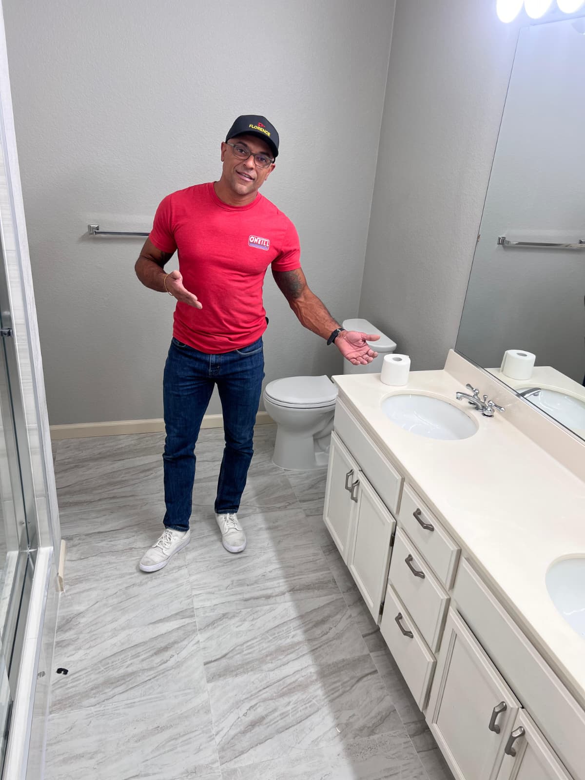 Junior, owner of Junior Elite Services, in a completed Bay Area bathroom renovation
