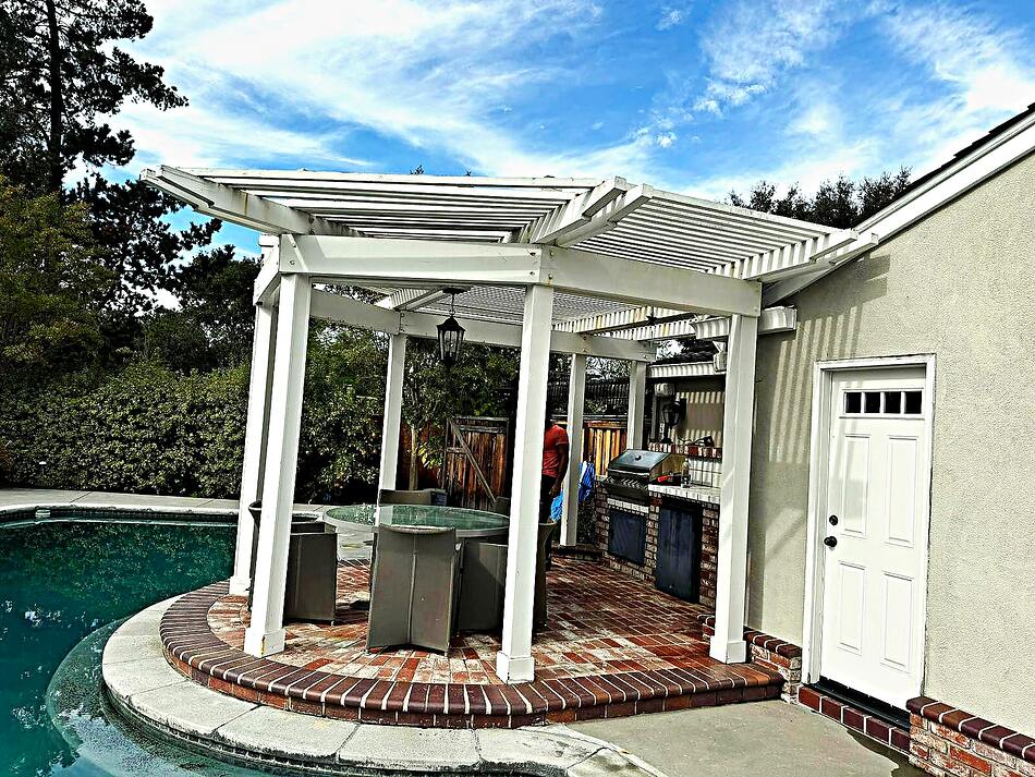 Poolside pergola and outdoor kitchen built in the Bay Area